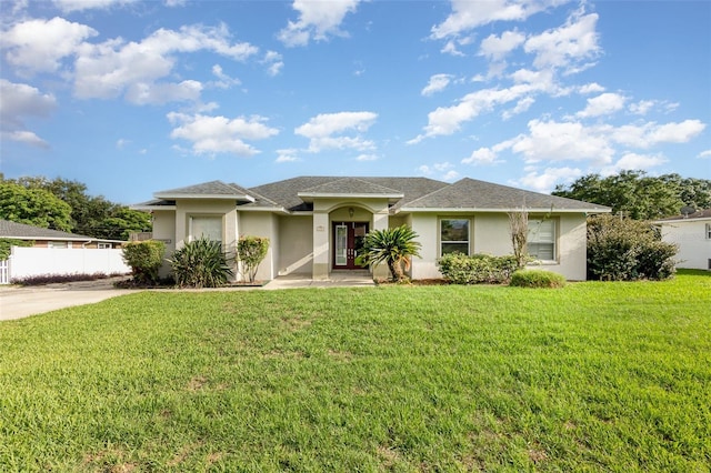 629 Orange Valley Ln, Lakeland, FL 33813 - view of front of home featuring stucco siding and roof with shingles