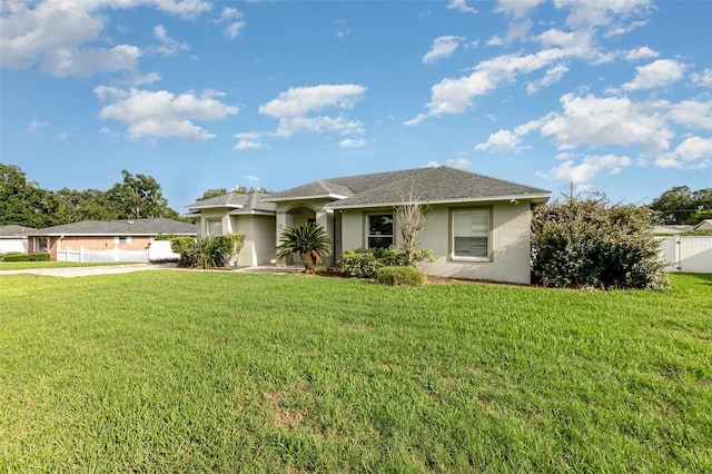 629 Orange Valley Ln, Lakeland, FL 33813 - ranch-style house featuring stucco siding, driveway, and a shingled roof