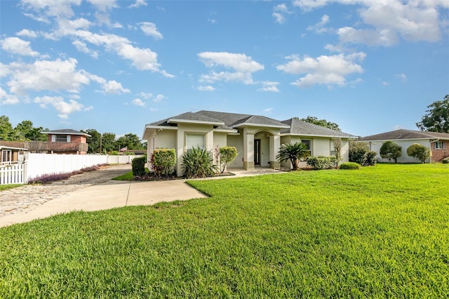 629 Orange Valley Ln, Lakeland, FL 33813 - view of front of home featuring stucco siding and a shingled roof