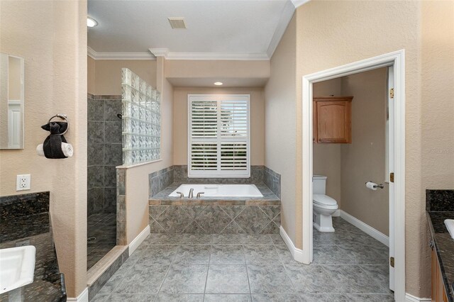 629 Orange Valley Ln, Lakeland, FL 33813 - full bath featuring ornamental molding, vanity, a bath, toilet, and a walk in shower