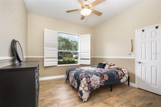 629 Orange Valley Ln, Lakeland, FL 33813 - bedroom with light wood-style floors, baseboards, and a ceiling fan