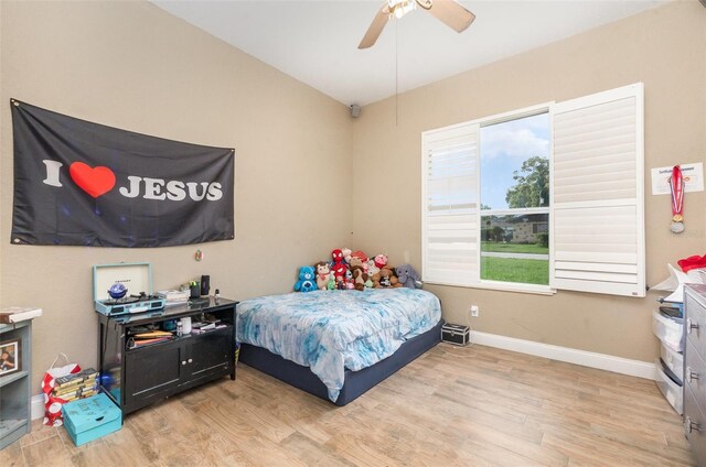 629 Orange Valley Ln, Lakeland, FL 33813 - bedroom featuring light wood finished floors, baseboards, and a ceiling fan