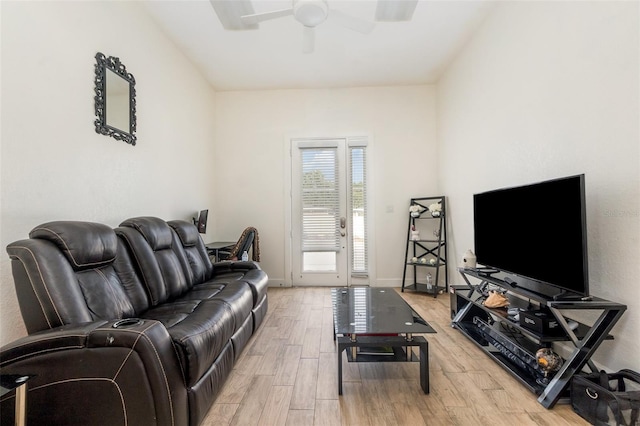 629 Orange Valley Ln, Lakeland, FL 33813 - living room featuring light wood finished floors, a ceiling fan, and baseboards