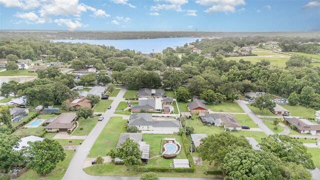 629 Orange Valley Ln, Lakeland, FL 33813 - aerial overview of property's location with nearby suburban area and a nearby body of water