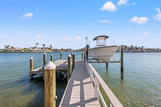 17077 Dolphin Dr, North Redington Beach, FL 33708 - dock area featuring boat lift and a water view