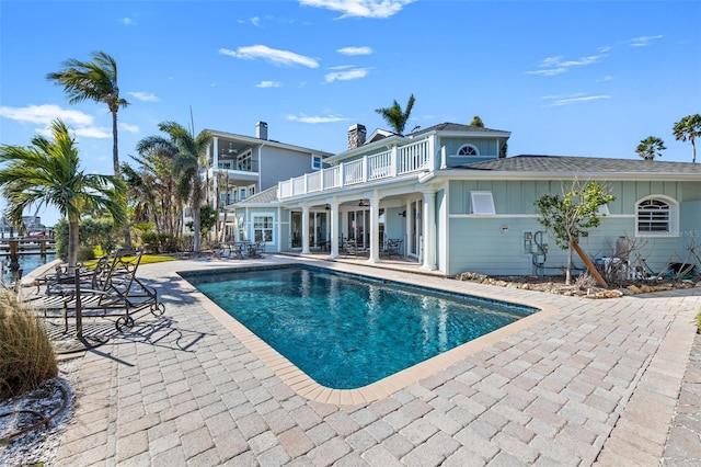 17077 Dolphin Dr, North Redington Beach, FL 33708 - swimming pool with a patio and ceiling fan