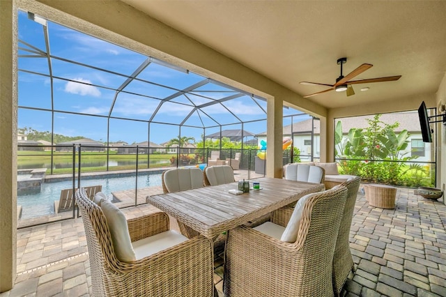 9136 Warm Springs Cir, Parrish, FL 34219 - view of patio / terrace featuring ceiling fan, a lanai, a residential view, a water view, and a pool with connected hot tub