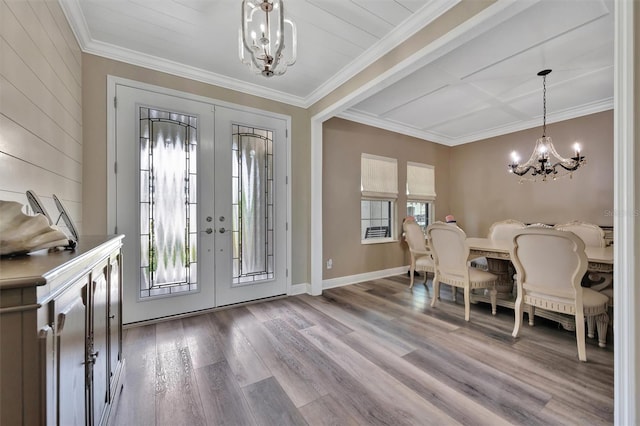 9136 Warm Springs Cir, Parrish, FL 34219 - entryway with a chandelier, french doors, wood finished floors, ornamental molding, and baseboards