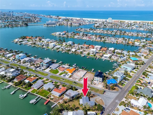 11465 7th St E, Treasure Island, FL 33706 - aerial view of property and surrounding area with a nearby body of water