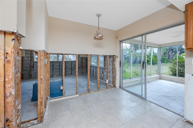 11465 7th St E, Treasure Island, FL 33706 - spare room featuring tile patterned floors