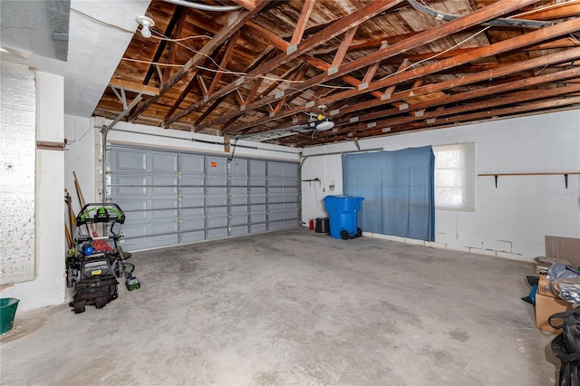 11465 7th St E, Treasure Island, FL 33706 - garage featuring a garage door opener