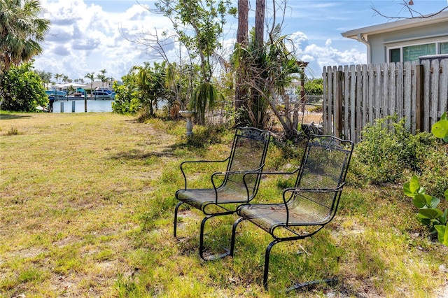 11465 7th St E, Treasure Island, FL 33706 - view of yard with a water view