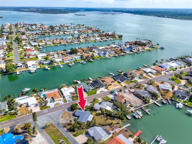 11465 7th St E, Treasure Island, FL 33706 - aerial view of property's location with a large body of water and nearby suburban area
