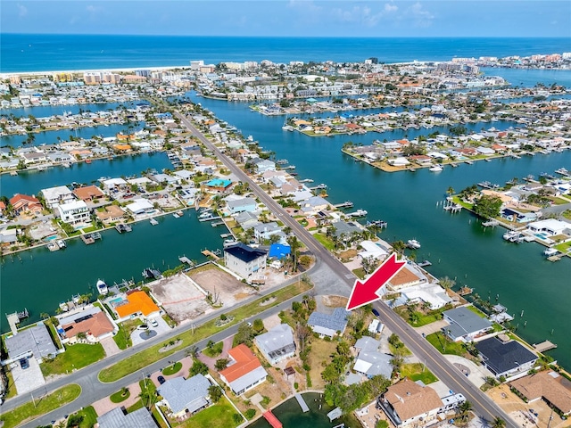 11465 7th St E, Treasure Island, FL 33706 - aerial overview of property's location with a large body of water and nearby suburban area