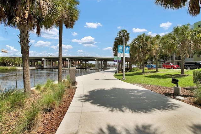 1501 Doyle Carlton Dr Unit 303, Tampa, FL 33602 - view of property's community with a lawn and a water view