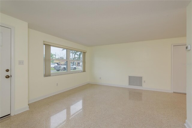 2020 Douglas Ave, Dunedin, FL 34698 - unfurnished room featuring baseboards