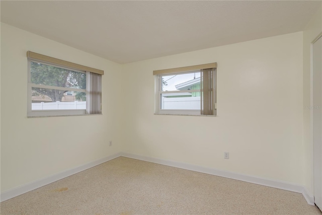 2020 Douglas Ave, Dunedin, FL 34698 - carpeted spare room with baseboards