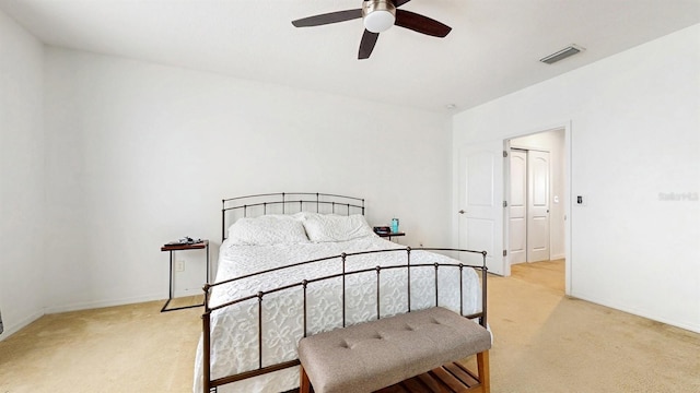 8111 Brickleton Woods Ave, Gibsonton, FL 33534 - bedroom with light colored carpet, ceiling fan, and baseboards