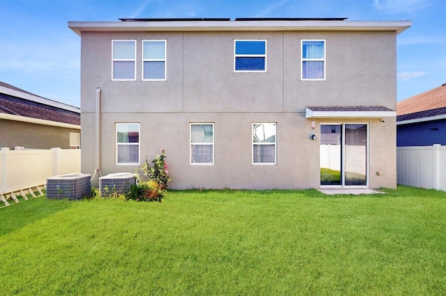 8111 Brickleton Woods Ave, Gibsonton, FL 33534 - back of house with central air condition unit and stucco siding