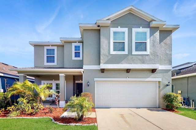 8111 Brickleton Woods Ave, Gibsonton, FL 33534 - view of front of property featuring stucco siding, concrete driveway, and an attached garage