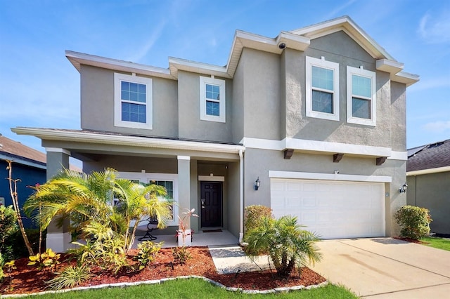 8111 Brickleton Woods Ave, Gibsonton, FL 33534 - view of front of property with covered porch, stucco siding, an attached garage, and concrete driveway