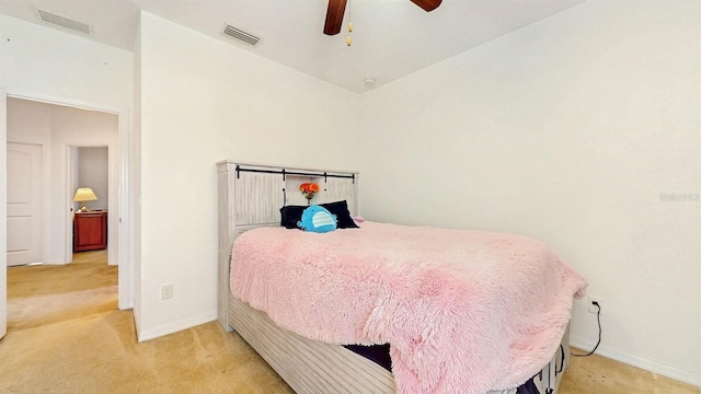 8111 Brickleton Woods Ave, Gibsonton, FL 33534 - bedroom with light colored carpet, baseboards, and a ceiling fan