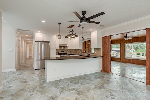 12 Bayou Ln, Palm Harbor, FL 34683 - kitchen featuring appliances with stainless steel finishes, ceiling fan, under cabinet range hood, white cabinets, and ornamental molding