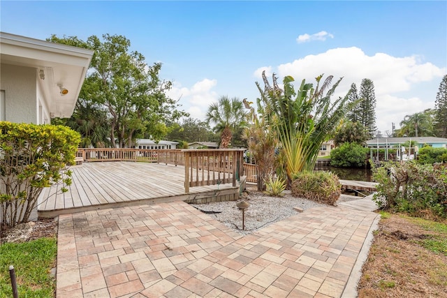 12 Bayou Ln, Palm Harbor, FL 34683 - view of patio with a deck