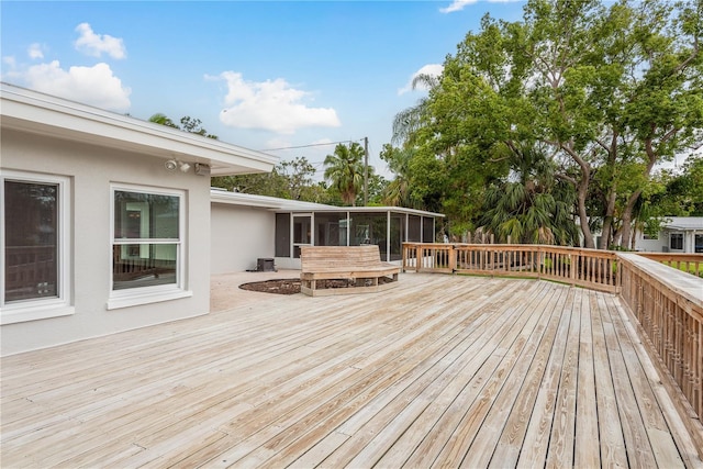 12 Bayou Ln, Palm Harbor, FL 34683 - deck with a sunroom