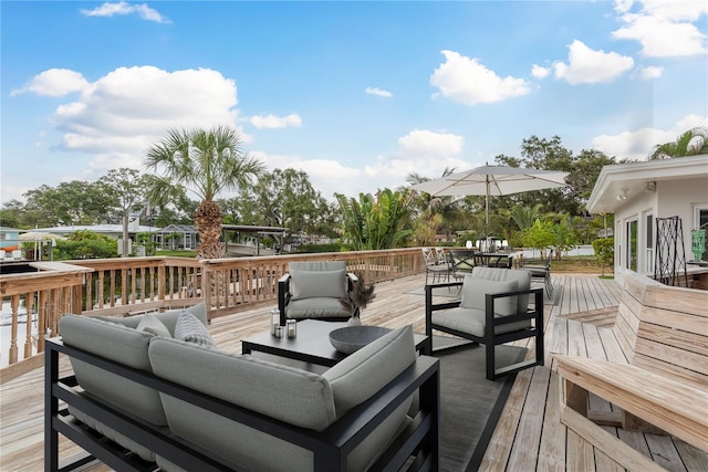 12 Bayou Ln, Palm Harbor, FL 34683 - wooden deck featuring outdoor lounge area