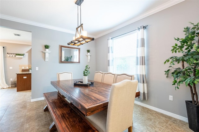12208 Mcmullen Loop, Riverview, FL 33569 - dining room with crown molding, light tile patterned floors, and baseboards