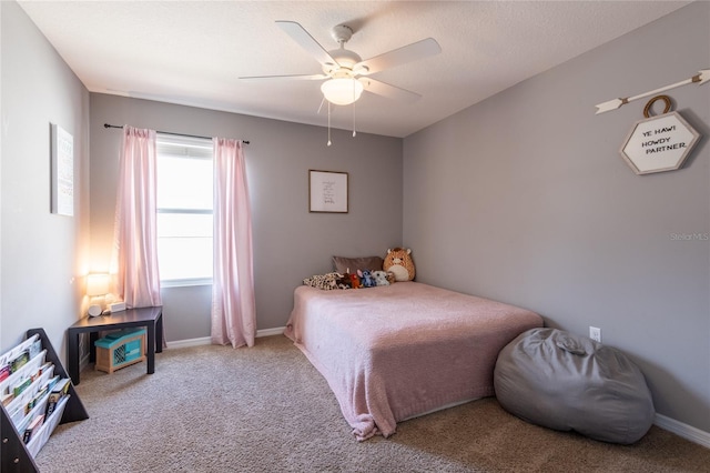 12208 Mcmullen Loop, Riverview, FL 33569 - bedroom featuring carpet floors, a ceiling fan, and baseboards