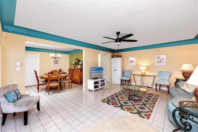 2096 Massachusetts Ave NE, Saint Petersburg, FL 33703 - living area with a chandelier, light tile patterned floors, ceiling fan, and baseboards