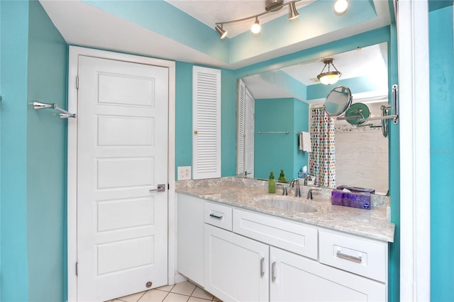 2096 Massachusetts Ave NE, Saint Petersburg, FL 33703 - full bath featuring vanity and tile patterned floors