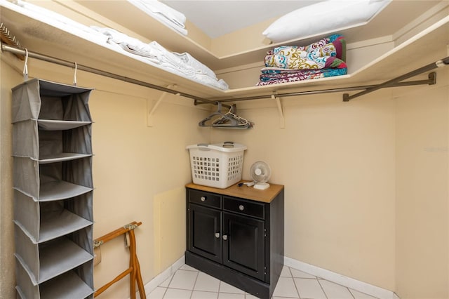 2096 Massachusetts Ave NE, Saint Petersburg, FL 33703 - walk in closet with light tile patterned flooring