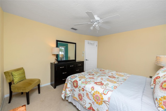 2096 Massachusetts Ave NE, Saint Petersburg, FL 33703 - bedroom with light colored carpet, baseboards, and a ceiling fan