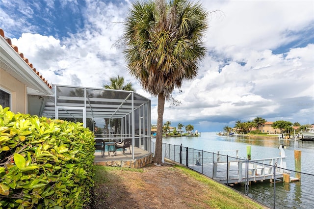 2096 Massachusetts Ave NE, Saint Petersburg, FL 33703 - dock area with a water view, a patio area, and a lanai