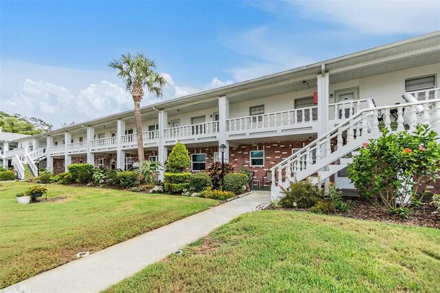 4748 Azalea Dr Unit 204, New Port Richey, FL 34652 - view of property featuring stairs