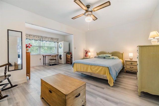 4748 Azalea Dr Unit 204, New Port Richey, FL 34652 - bedroom featuring light wood-style flooring, ceiling fan, and baseboards