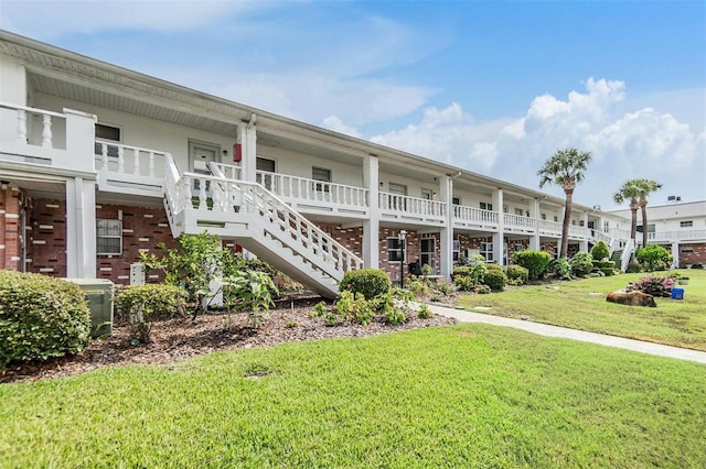 4748 Azalea Dr Unit 204, New Port Richey, FL 34652 - view of building exterior with stairway