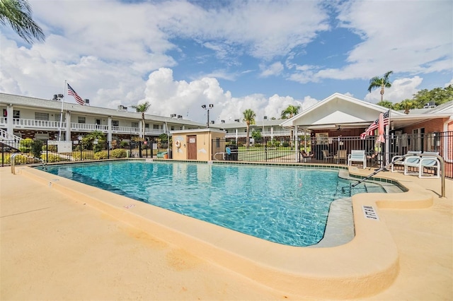 4748 Azalea Dr Unit 204, New Port Richey, FL 34652 - community pool with a patio area and ceiling fan