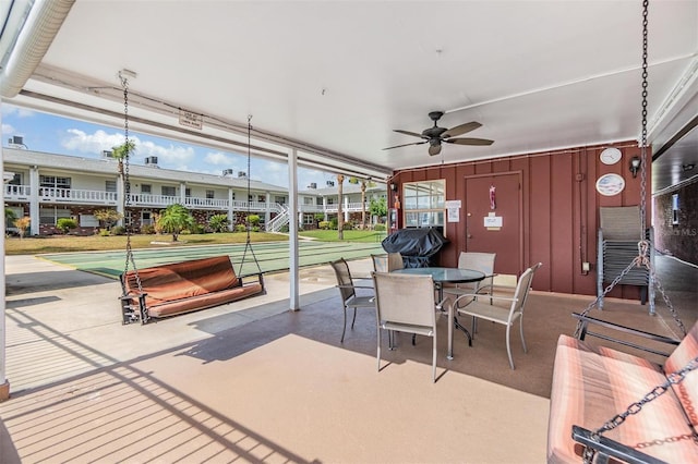 4748 Azalea Dr Unit 204, New Port Richey, FL 34652 - view of patio with shuffleboard, ceiling fan, and outdoor dining area