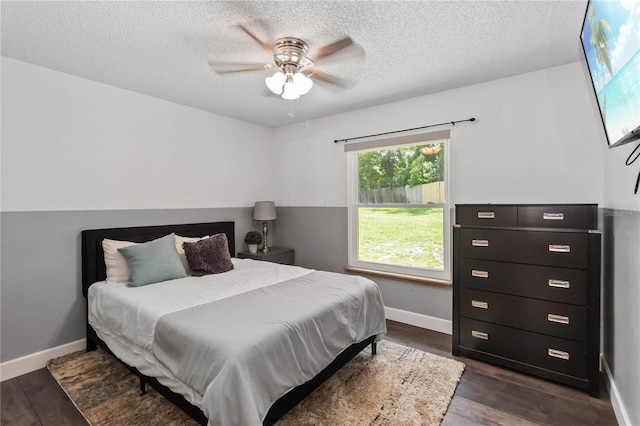 722 Swaying Palm Dr, Apopka, FL 32712 - bedroom featuring a textured ceiling, dark wood-style floors, and ceiling fan