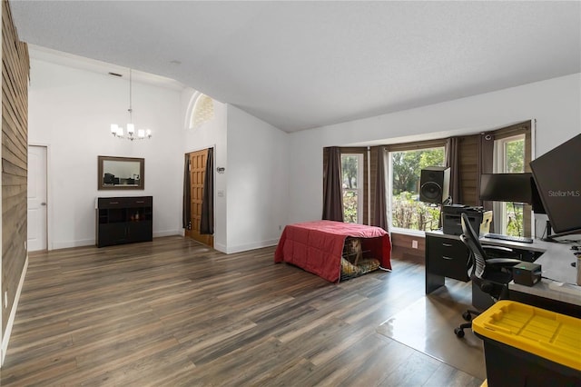 722 Swaying Palm Dr, Apopka, FL 32712 - office featuring a chandelier, wood finished floors, a fireplace, and high vaulted ceiling