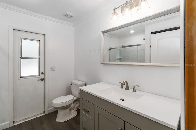 722 Swaying Palm Dr, Apopka, FL 32712 - full bathroom with crown molding, vanity, wood finished floors, and a shower with shower door