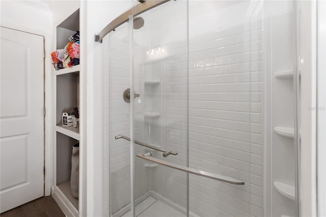 722 Swaying Palm Dr, Apopka, FL 32712 - full bathroom with a stall shower and wood finished floors