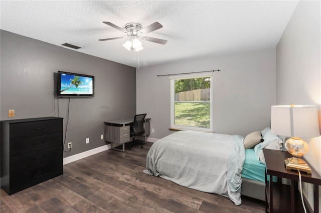 722 Swaying Palm Dr, Apopka, FL 32712 - bedroom featuring wood finished floors, an office area, a textured ceiling, and a ceiling fan