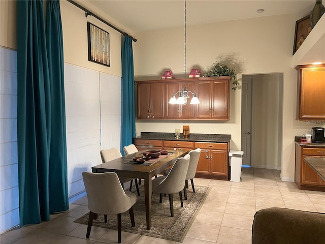 12064 Navale Ln, Orlando, FL 32827 - dining space featuring a chandelier and light tile patterned floors