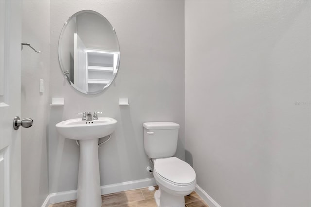 4262 Cloud Hopper Way, Lutz, FL 33559 - half bathroom featuring toilet and baseboards