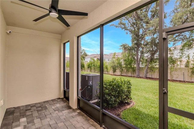 4262 Cloud Hopper Way, Lutz, FL 33559 - unfurnished sunroom featuring a ceiling fan